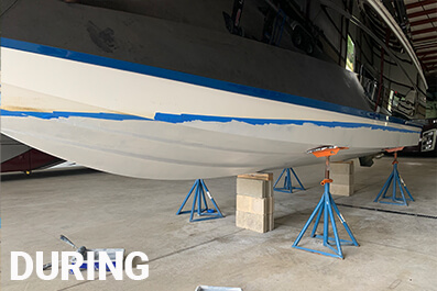 Boat bottom in the process of being painted