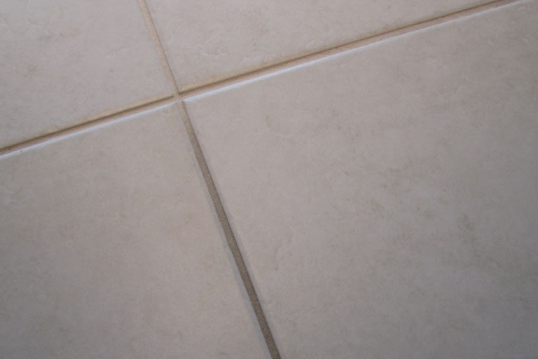 What Causes Grout Discoloration?