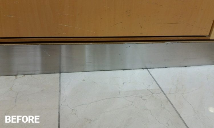 Scratched Metal Beneath Cabinets
