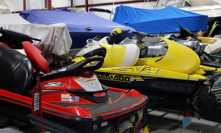 Boats and Jet Skis in GK's Custom Polishing Climate-Controlled Indoor Storage Facility